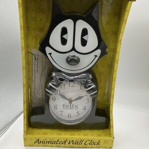 New in box Feix the Cat wall clock